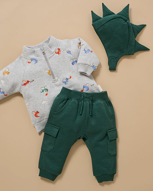 blue long sleeve top and brown quilted track pants